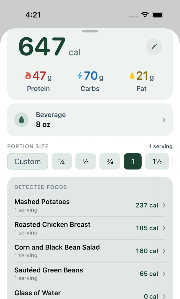A logged meal in Calvin, showing 647 calories broken down into mashed potatoes, roasted chicken breast, corn and black bean salad, sauteed green beans and a glass of water, each with its own calorie figure.